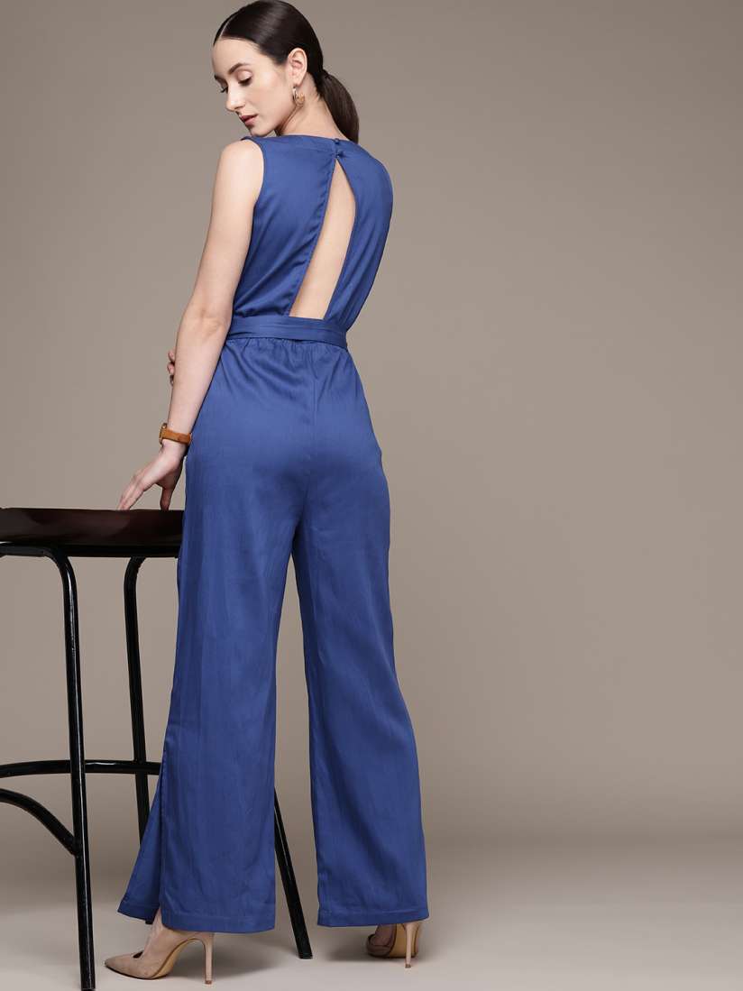 Bebe blue jumpsuit cheap