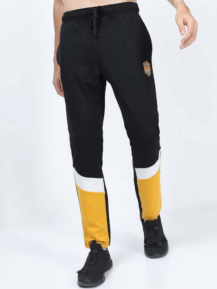 Yellow black and white track pants cheap
