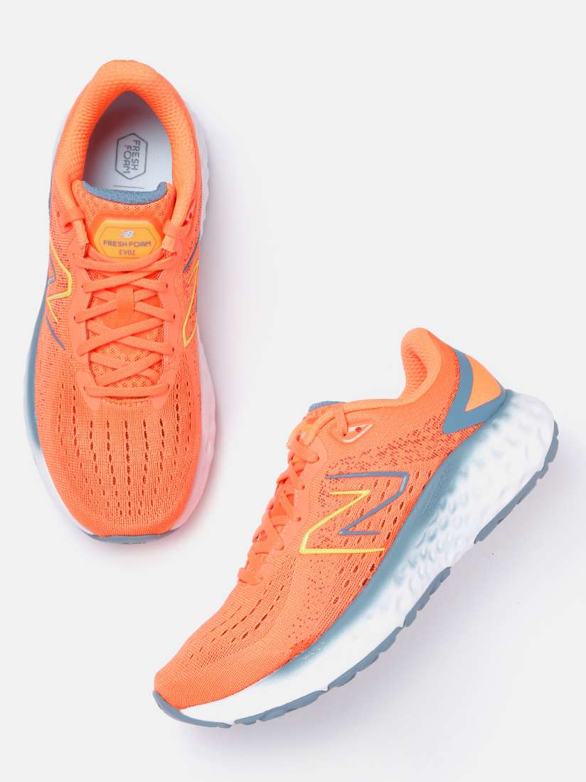 Mens orange new balance shoes shop