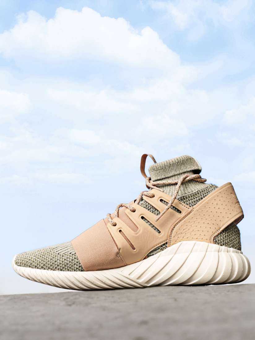 Adidas originals tubular rise trainers in beige store