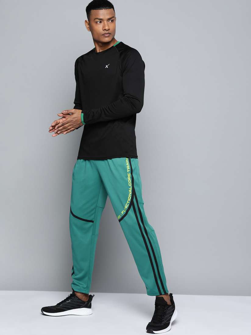 Buy HRX By Hrithik Roshan Training Men Rapid Dry Typography Track Pants Track Pants for Men 17859376 Myntra