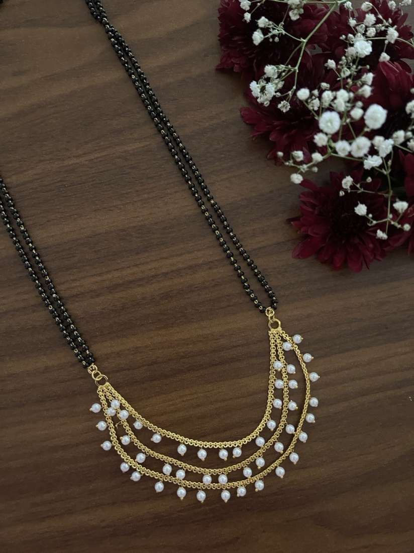 White moti mangalsutra sales