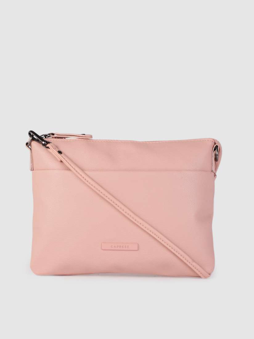 Caprese pink solid sling bag shop