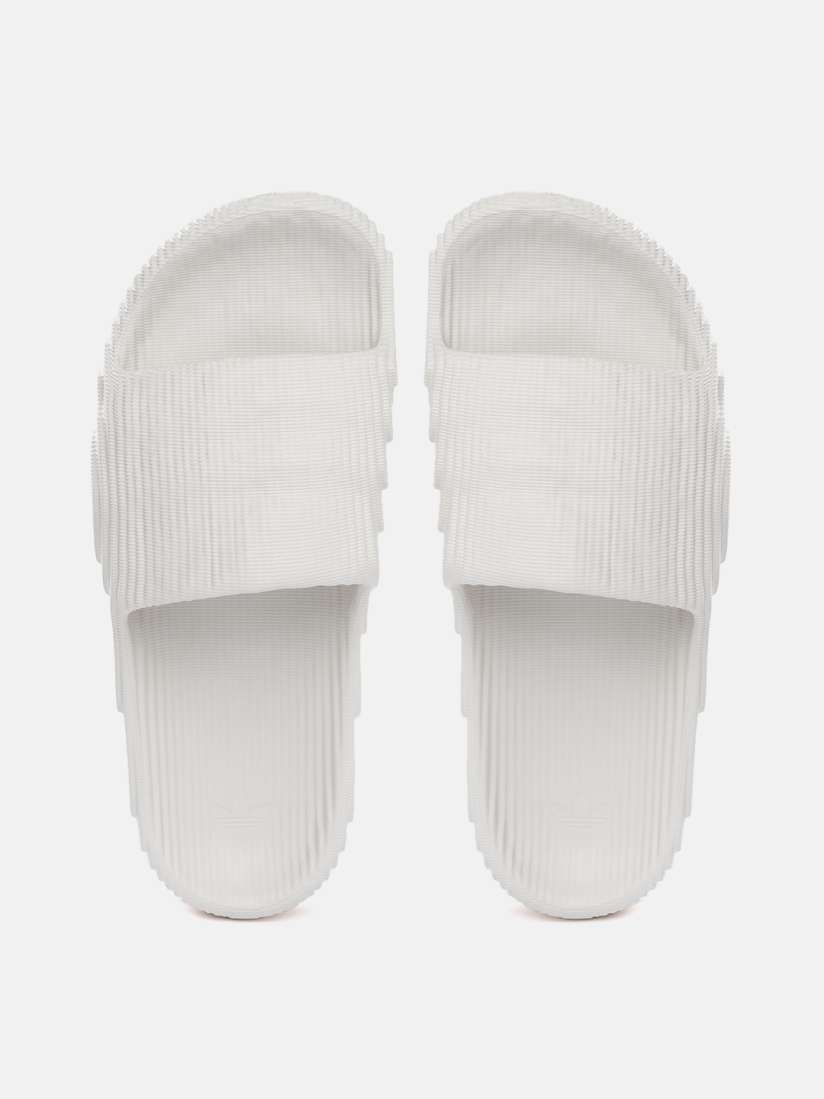 Adidas slippers myntra top