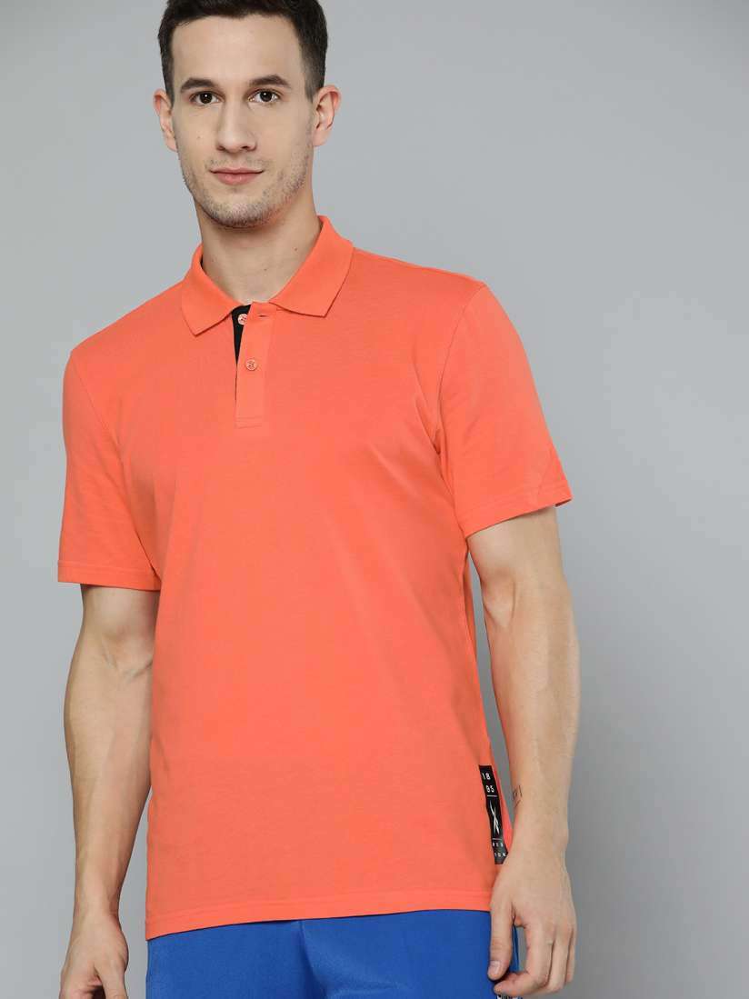Buy Reebok Men Orange Solid Polo Collar Pure Cotton T shirt Tshirts for Men 18667156 Myntra