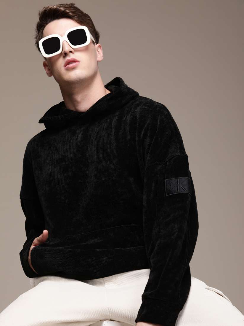 Buy Calvin Klein Jeans Men Black Solid Velvet Hooded Sweatshirt Sweatshirts for Men 18828018 Myntra
