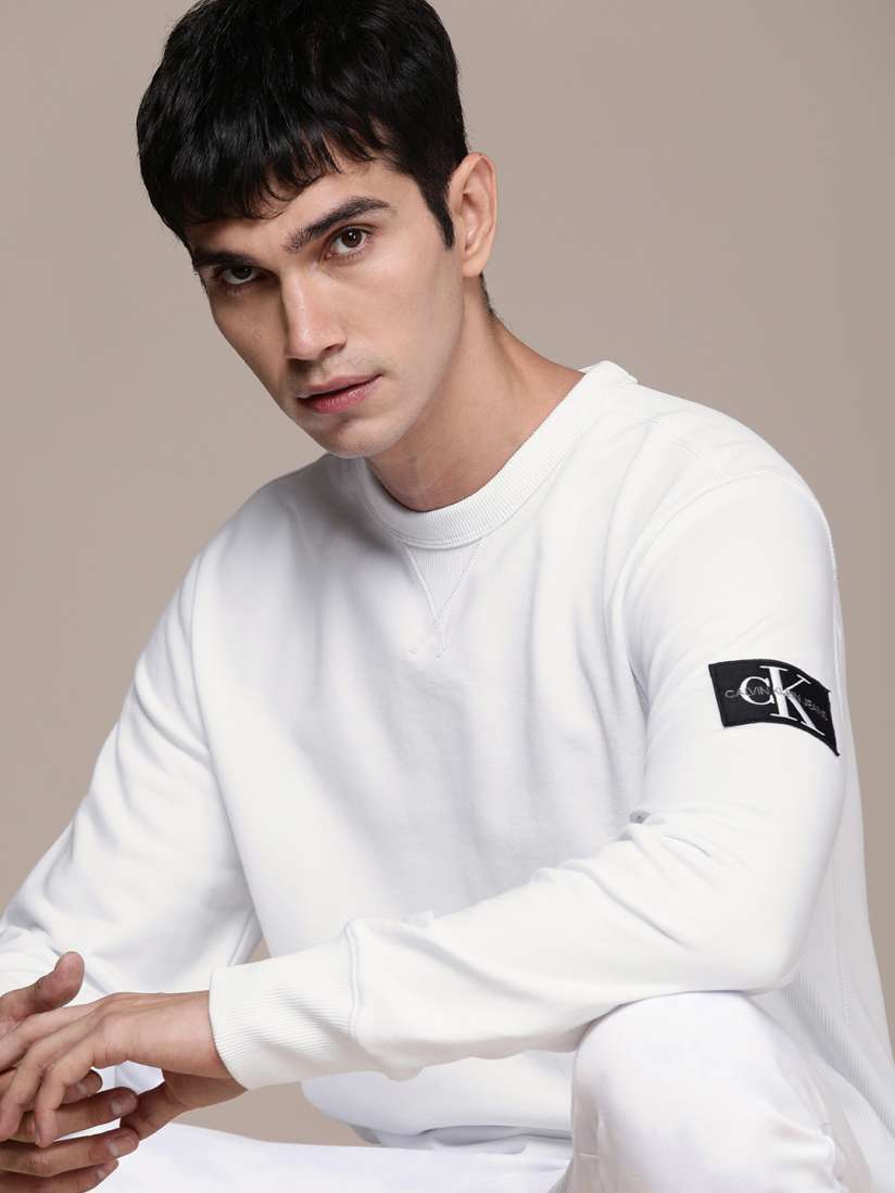 Buy Calvin Klein Jeans Men White Solid Pure Cotton Sweatshirt Sweatshirts for Men 18828150 Myntra
