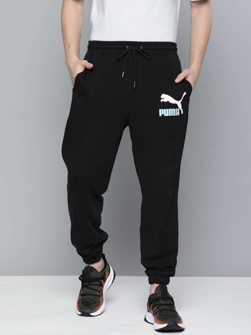 Buy Puma Men Solid Relaxed Fit Mid Rise Pure Cotton Fandom Sweatpants Joggers With Applique Track Pants for Men 18981328 Myntra
