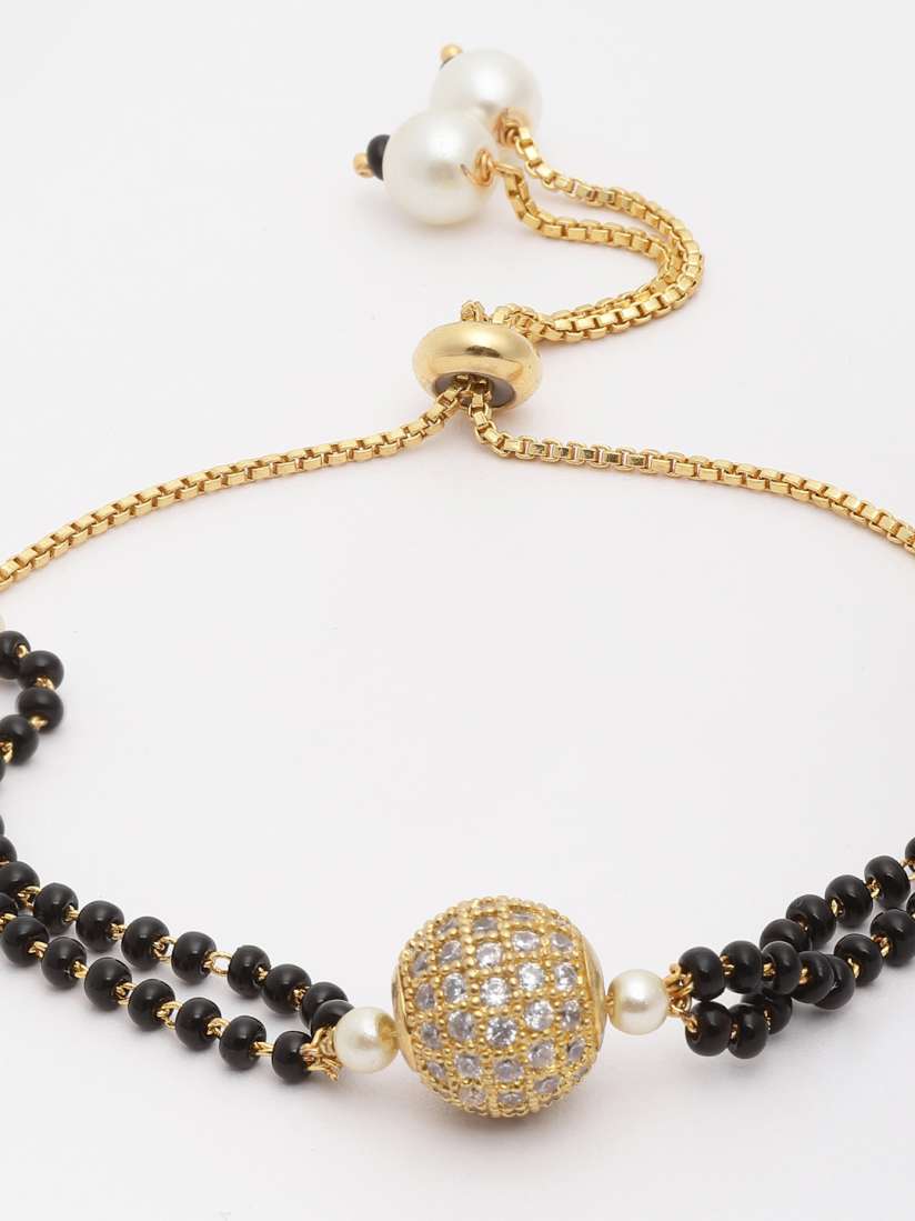 Buy PANASH Gold Plated Black Artificial Stones Beads Studded Hand Mangalsutra Mangalsutra for Women 19000466 Myntra