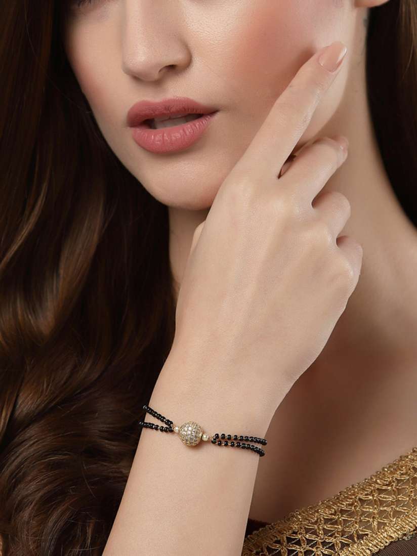 Buy PANASH Gold Plated Black Artificial Stones Beads Studded Hand Mangalsutra Mangalsutra for Women 19000466 Myntra