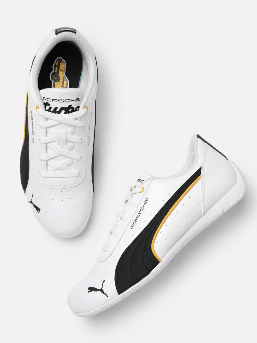 Puma white sneakers myntra sales