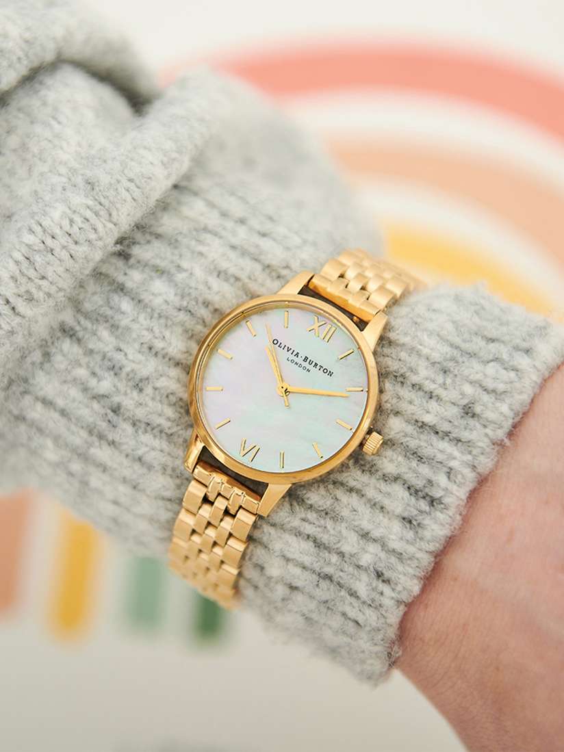 Olivia burton yellow gold watch top