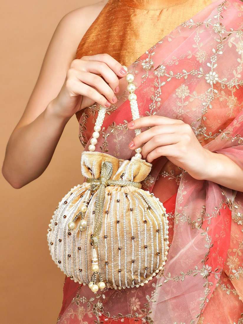 Buy Rubans Cream Coloured White Embroidered Potli Clutch Clutches for Women 19301544 Myntra
