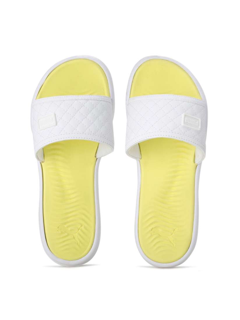 Yellow puma slides top