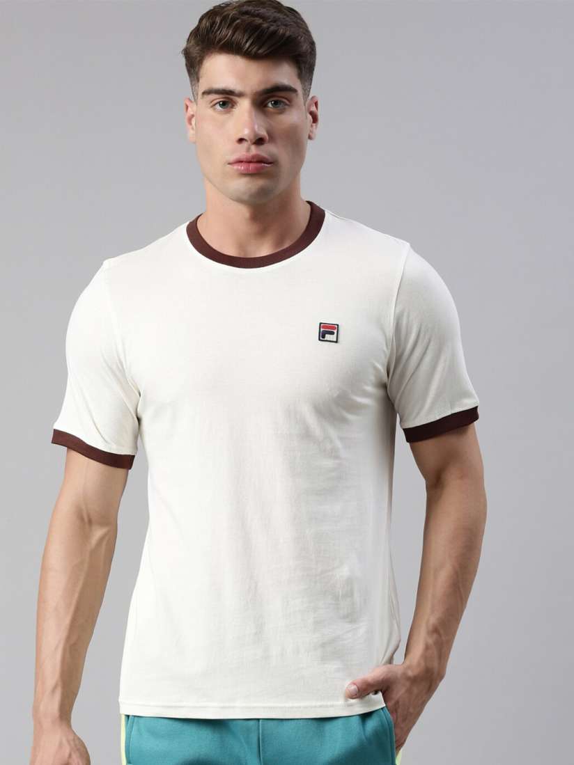 Cream fila shirt shop