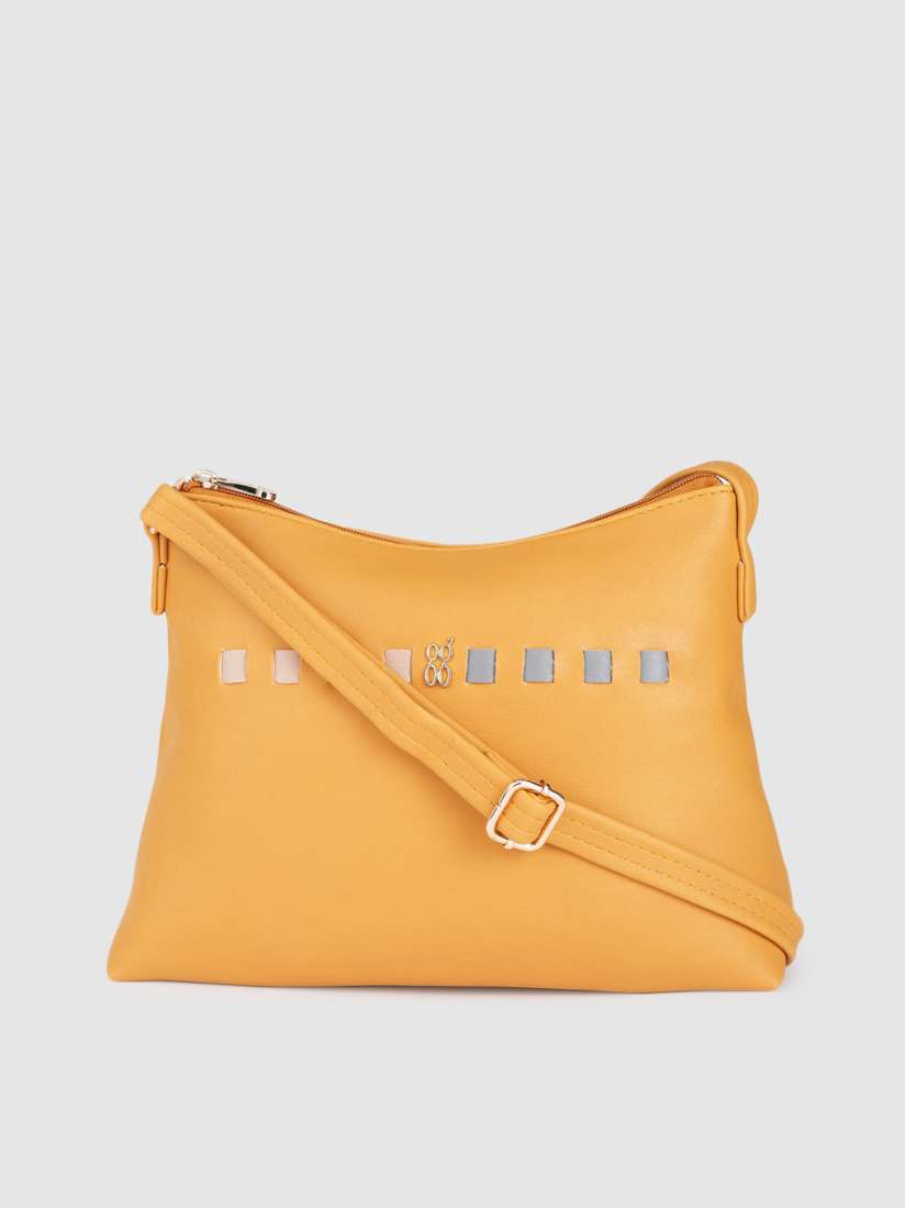 Baggit mustard yellow solid sling bag discount
