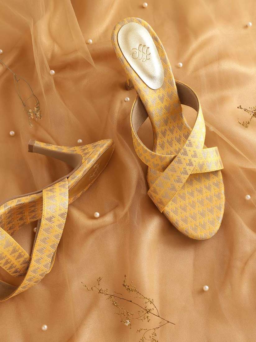 Yellow gold sandal heels top