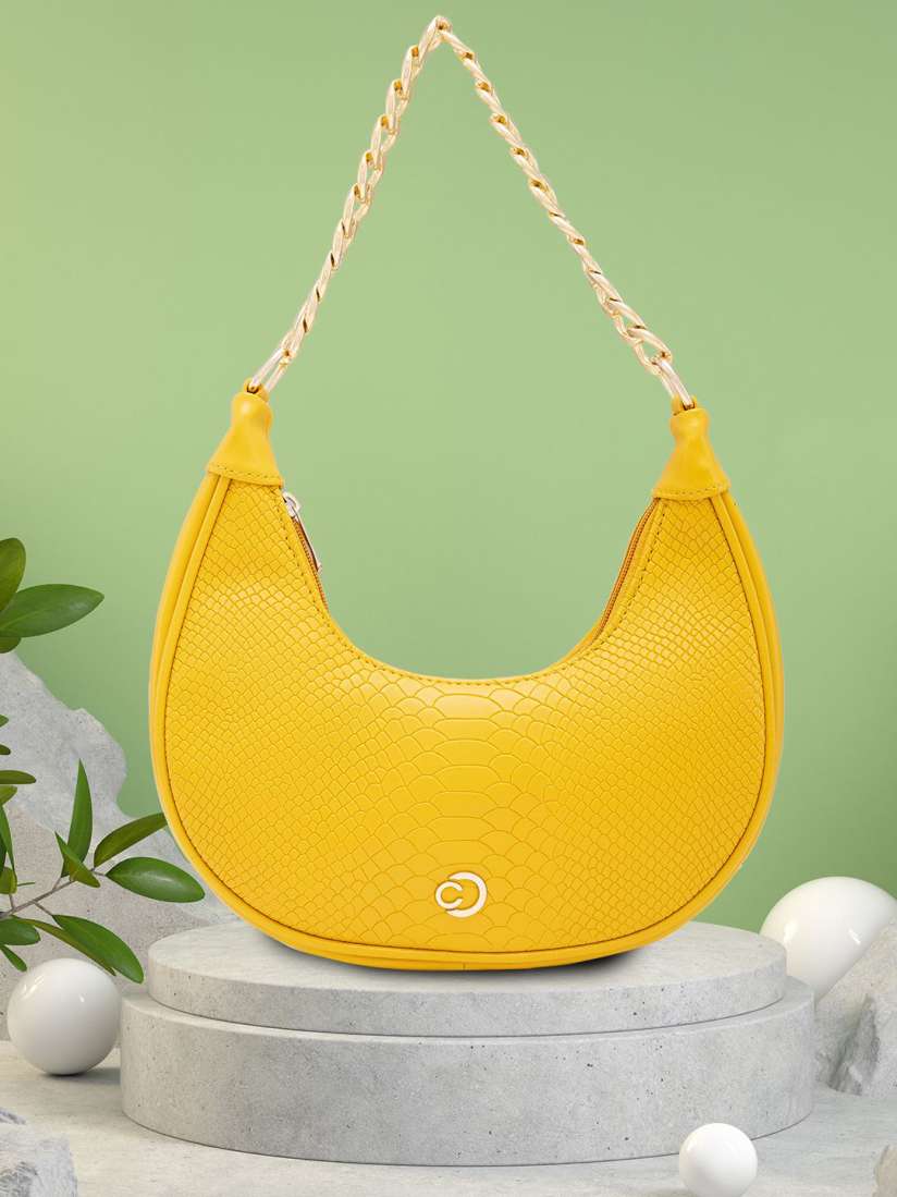 Buy Caprese PU Half Moon Hobo Bag with Tasselled Handbags for Women 30445281 Myntra