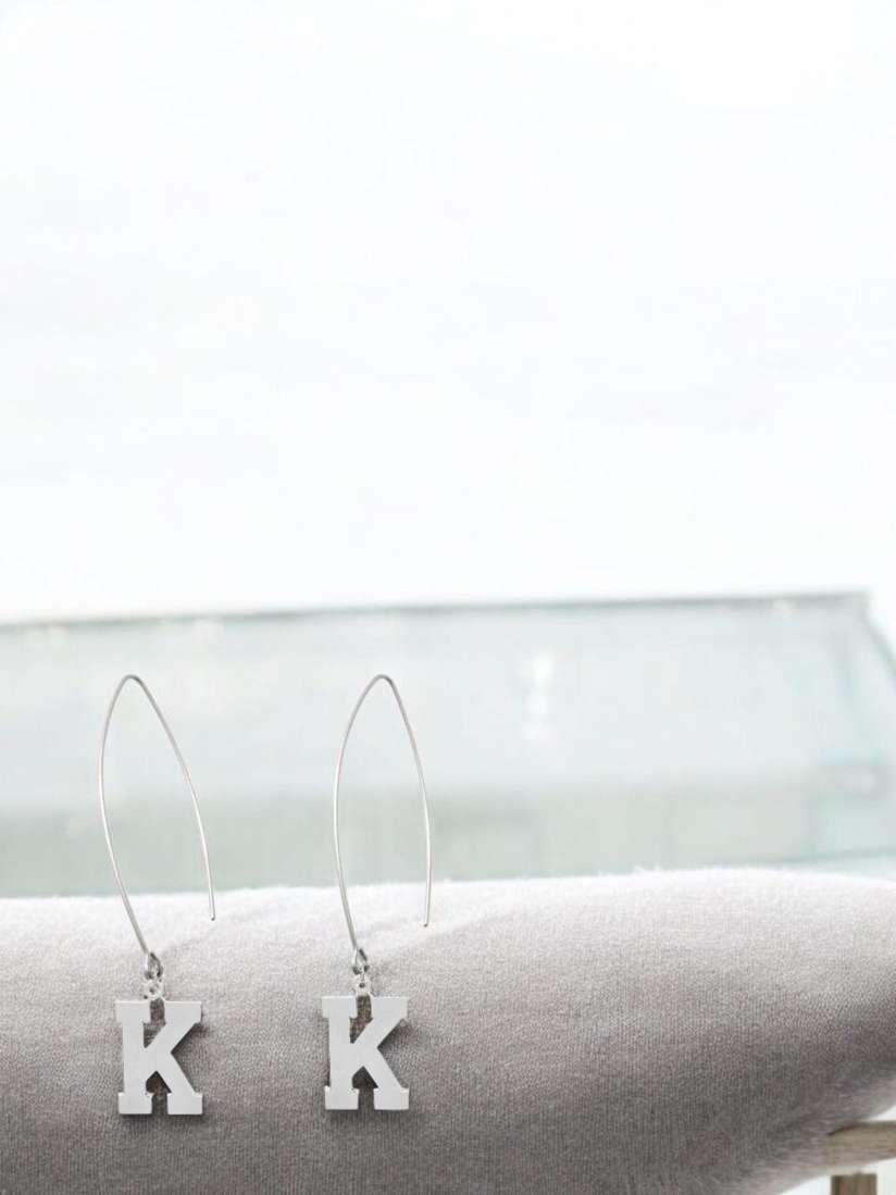 Silver alphabet earrings store