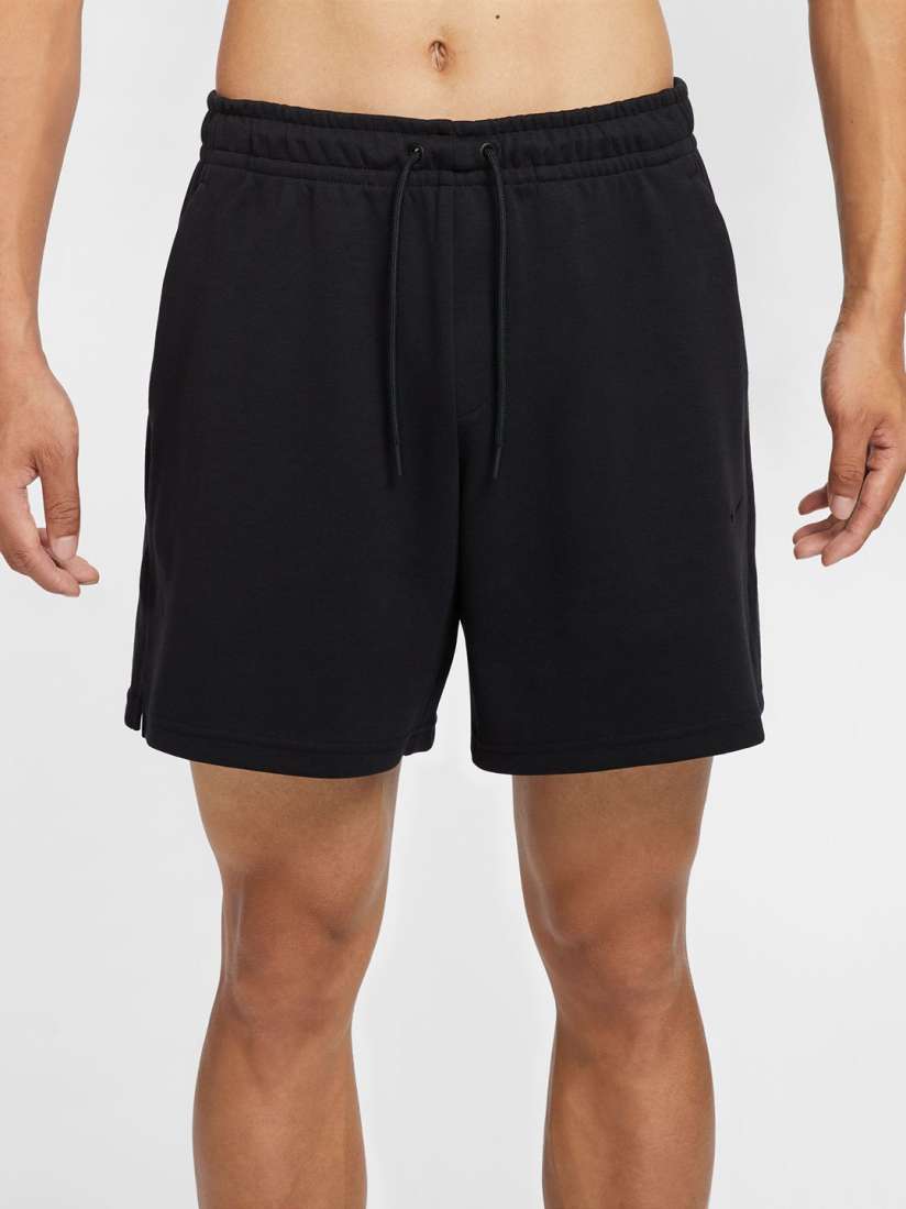 Buy Nike Solid Primary Men s 18cm Dri FIT UV Unlined Versatile Shorts Shorts for Men 30833354 Myntra