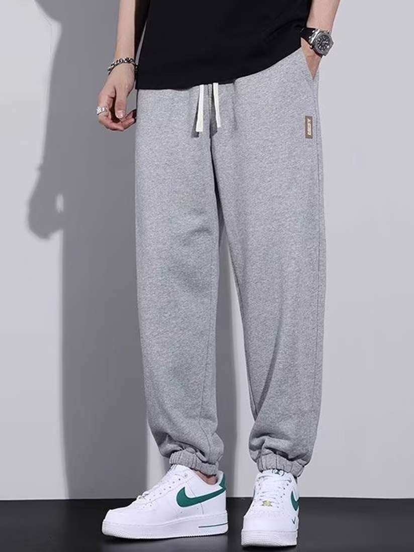 Buy StyleCast Men Loose Fit Joggers - Trousers for Men 30926401 | Myntra