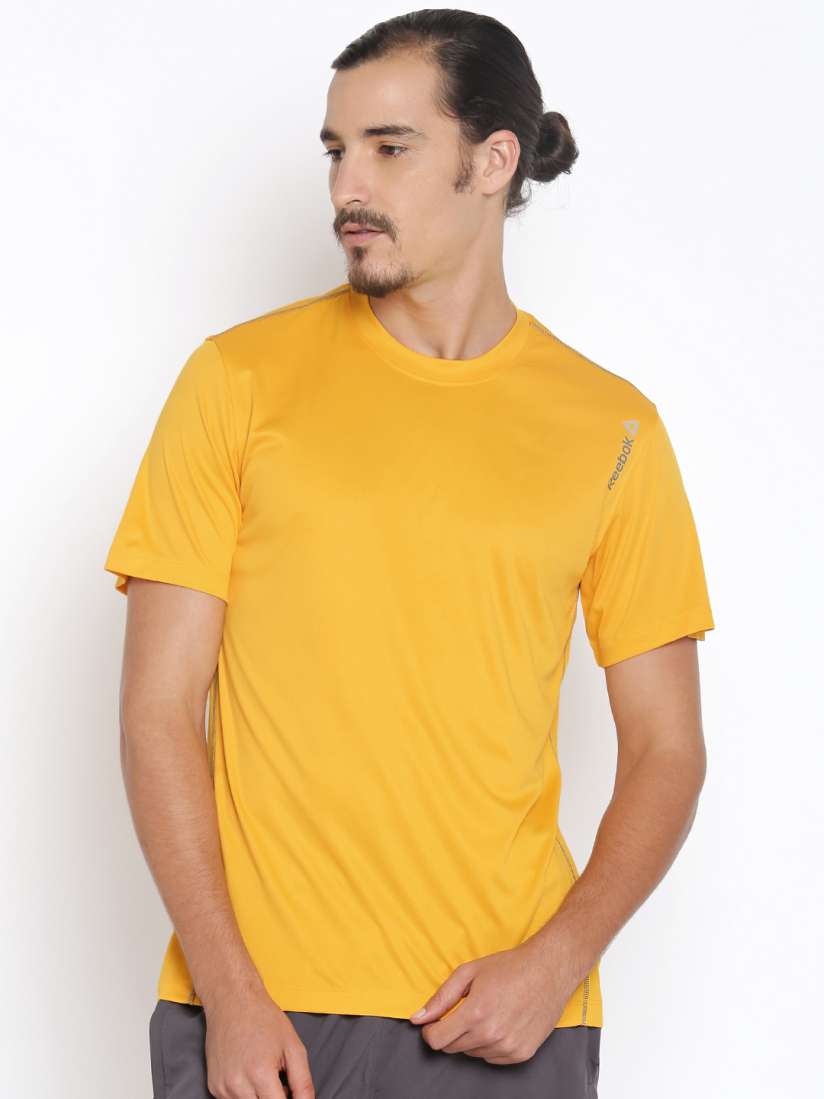 Reebok yellow t shirts top
