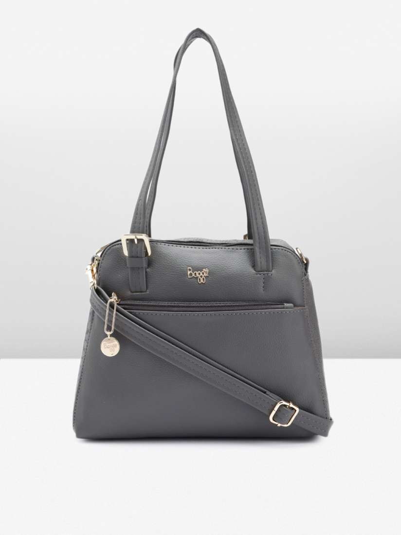 Buy Baggit Solid PU Structured Handheld Bag with Brand Logo Tasselled Detail Handbags for Women 20537622 Myntra