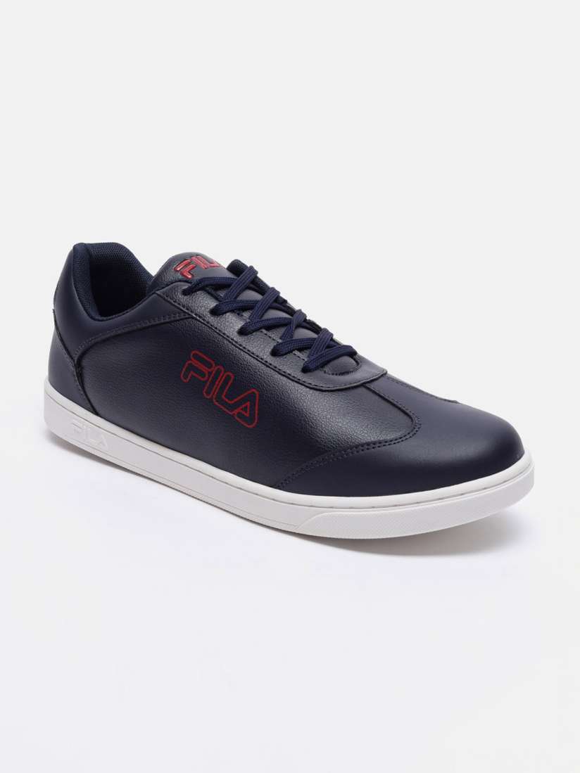 Navy blue fila trainers on sale