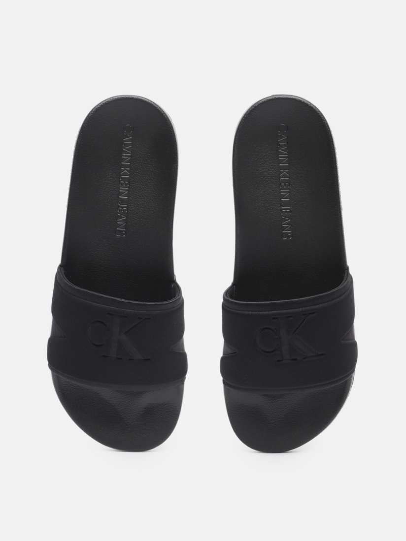 Buy Calvin Klein Jeans Men Self Print Sliders Flip Flops for Men 21043808 Myntra