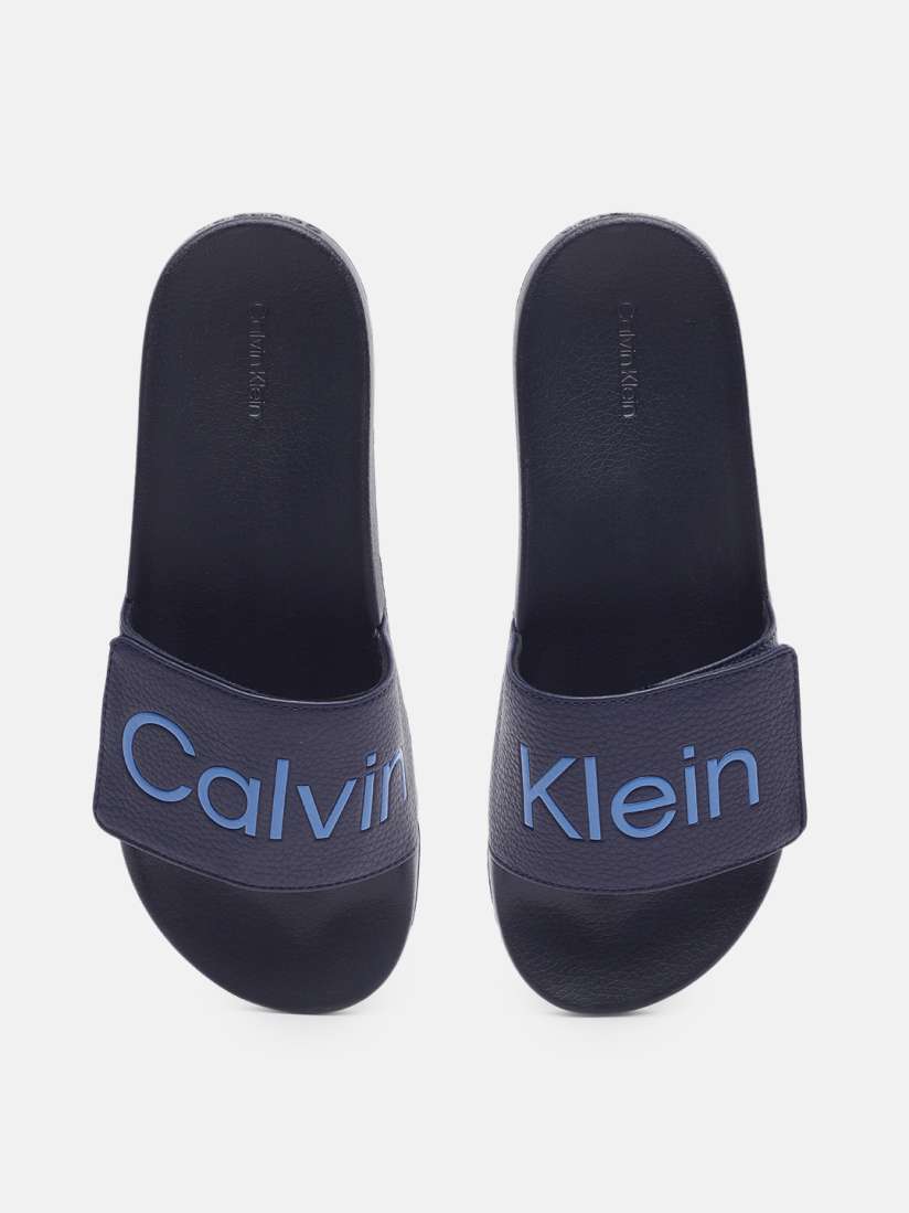Buy Calvin Klein Jeans Men ADJ POOL Brand Logo Printed Sliders Flip Flops for Men 21043884 Myntra
