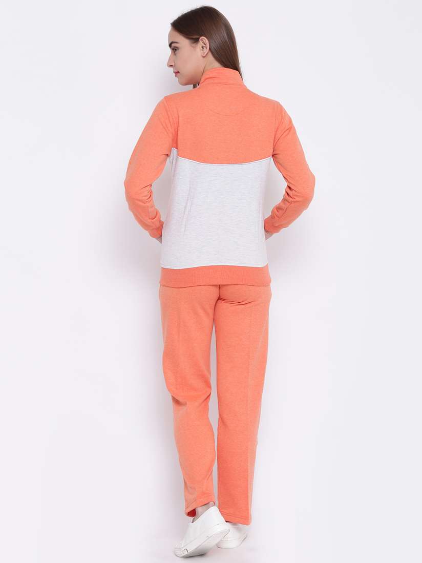 White and orange tracksuit on sale
