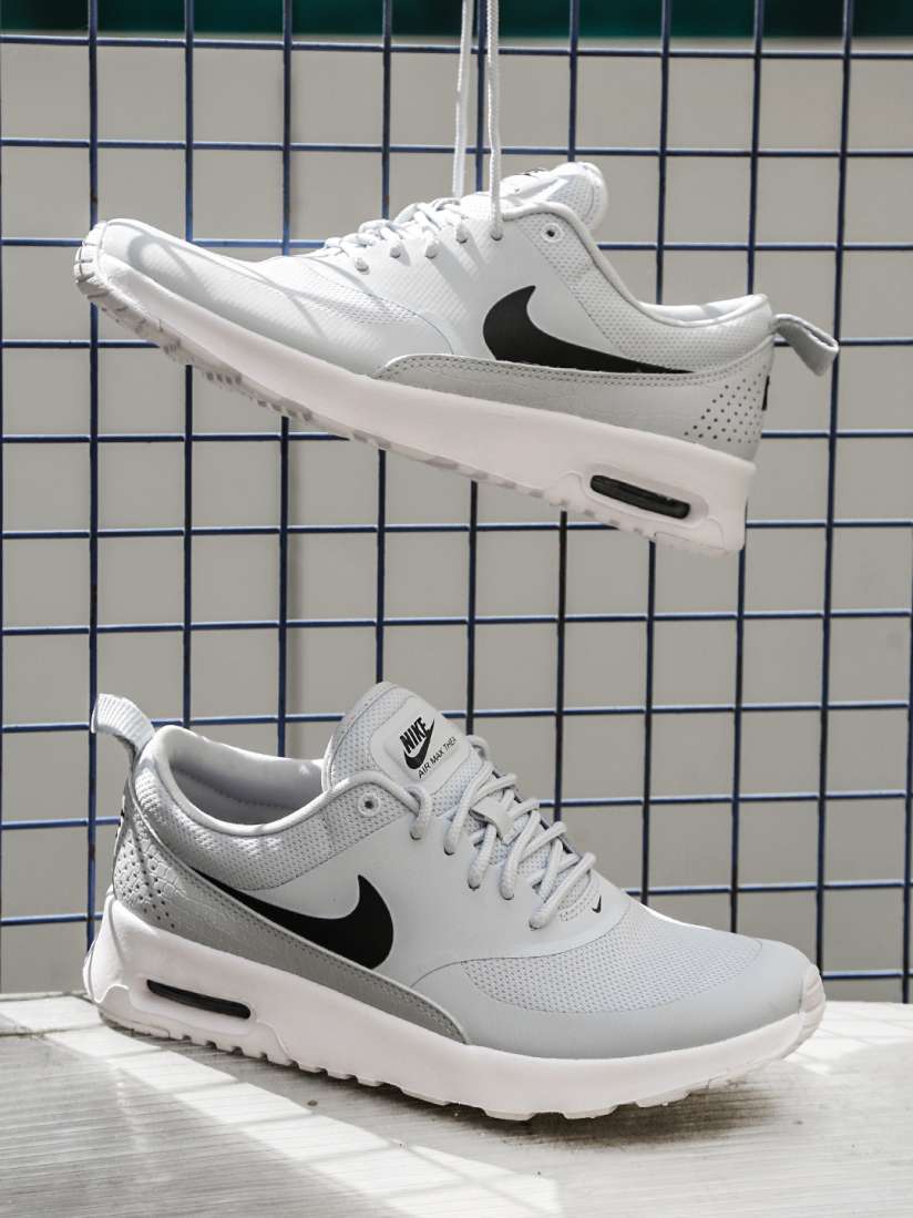 White nike thea trainers deals