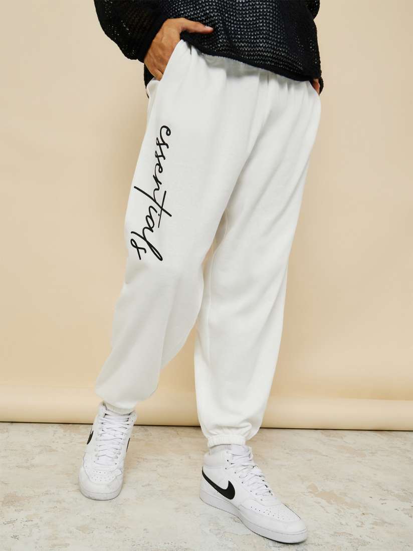 Buy Styli Men Slogan Print Oversized Jogger With Slip Pocket Track Pants for Men 22428852 Myntra
