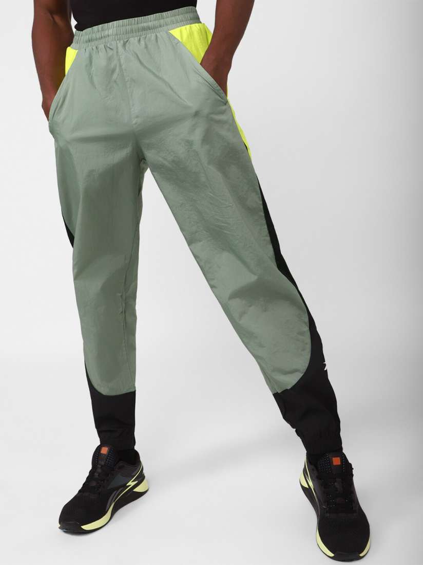 Buy Reebok Men Train Woven Track Pants Track Pants for Men 22623148 Myntra