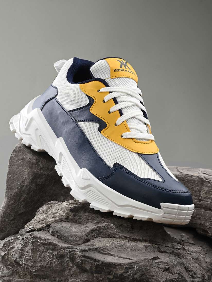 Yellow and navy blue sneakers top
