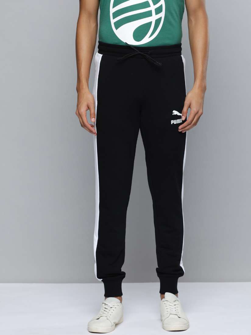 Buy Puma Men Brand Logo Printed Iconic T7 Joggers With Side Stripes Track Pants for Men 23087600 Myntra