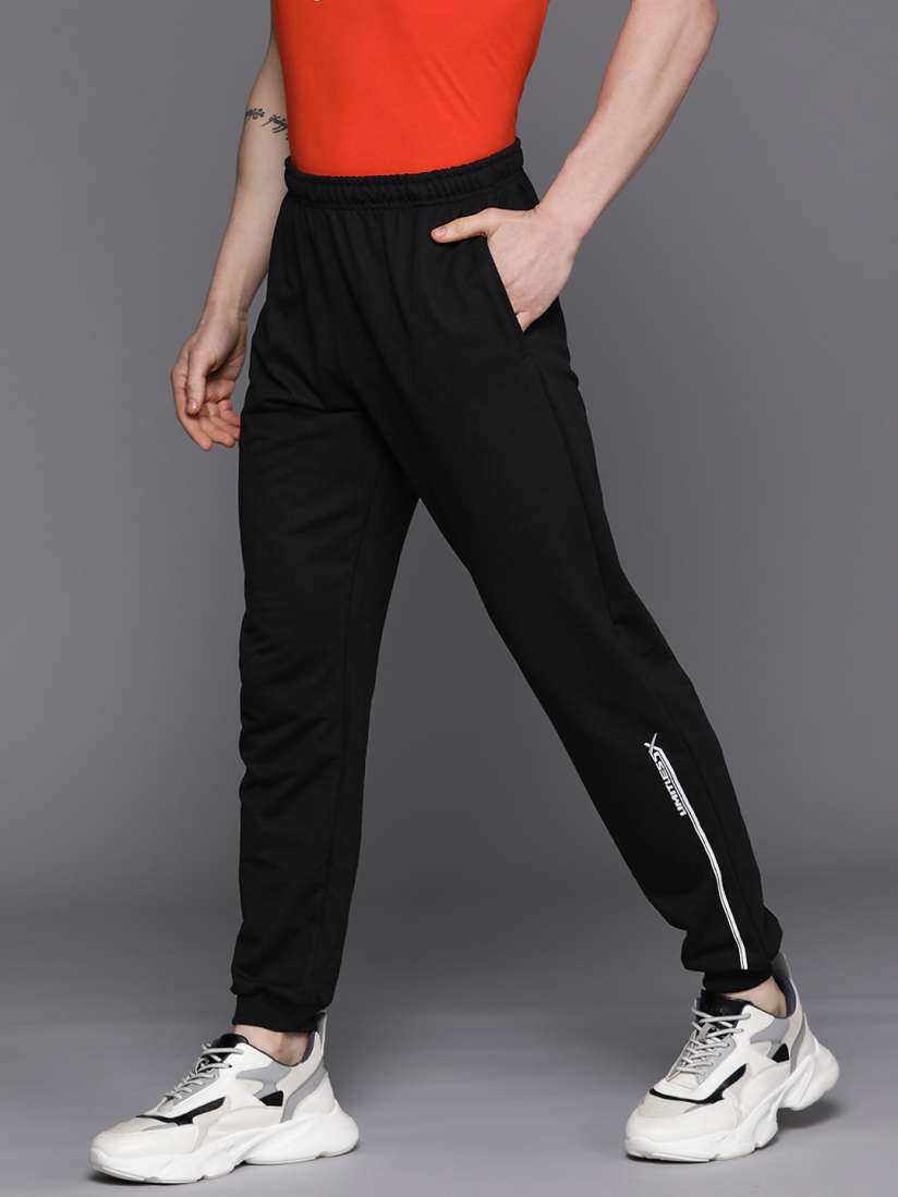Buy HRX by Hrithik Roshan Men s Typography Printed Lifestyle Track Pants Track Pants for Men 23543962 Myntra