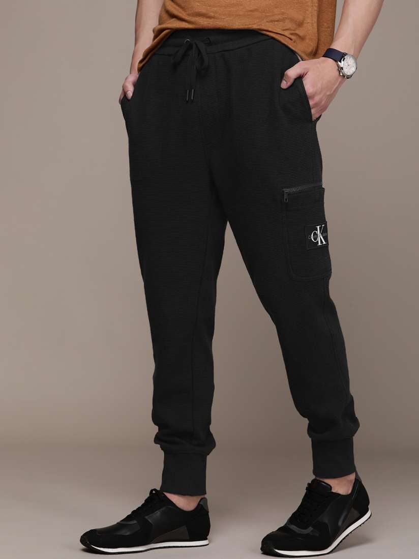 Buy Calvin Klein Jeans Men Pure Cotton Solid Regular Fit Jogger Track Pants Track Pants for Men 23710566 Myntra