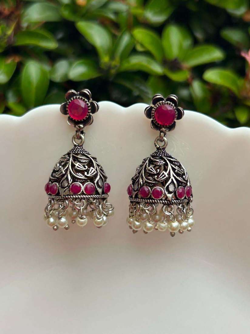 Myntra Ozanoo Jhumkas Jewels Galaxy Green Oxidised Silver-Plated