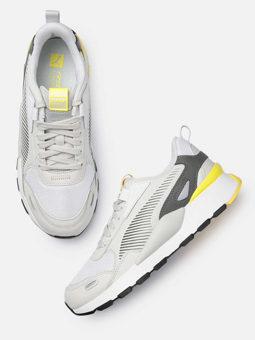 Puma white sneakers myntra sales