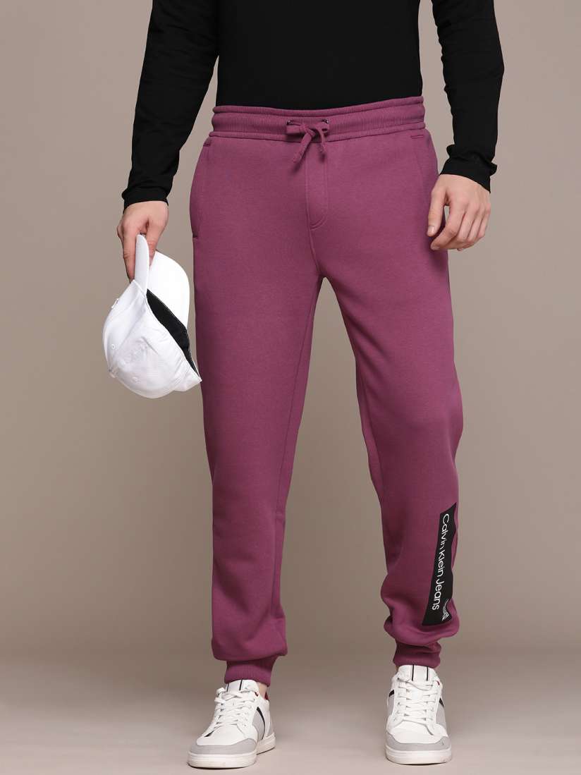 Buy Calvin Klein Jeans Men Solid Mid Rise Joggers Track Pants Track Pants for Men 24351072 Myntra
