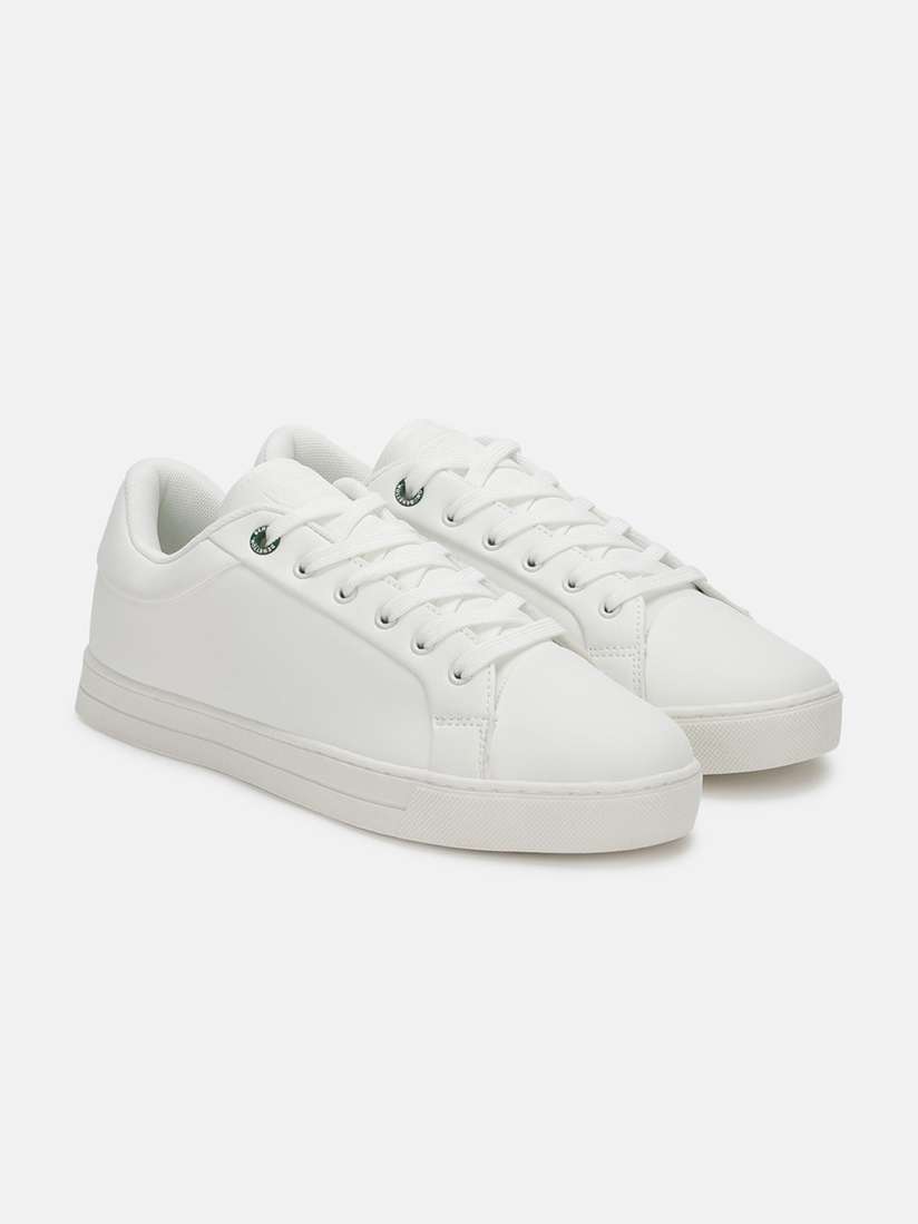 Ucb white sneakers myntra outlet