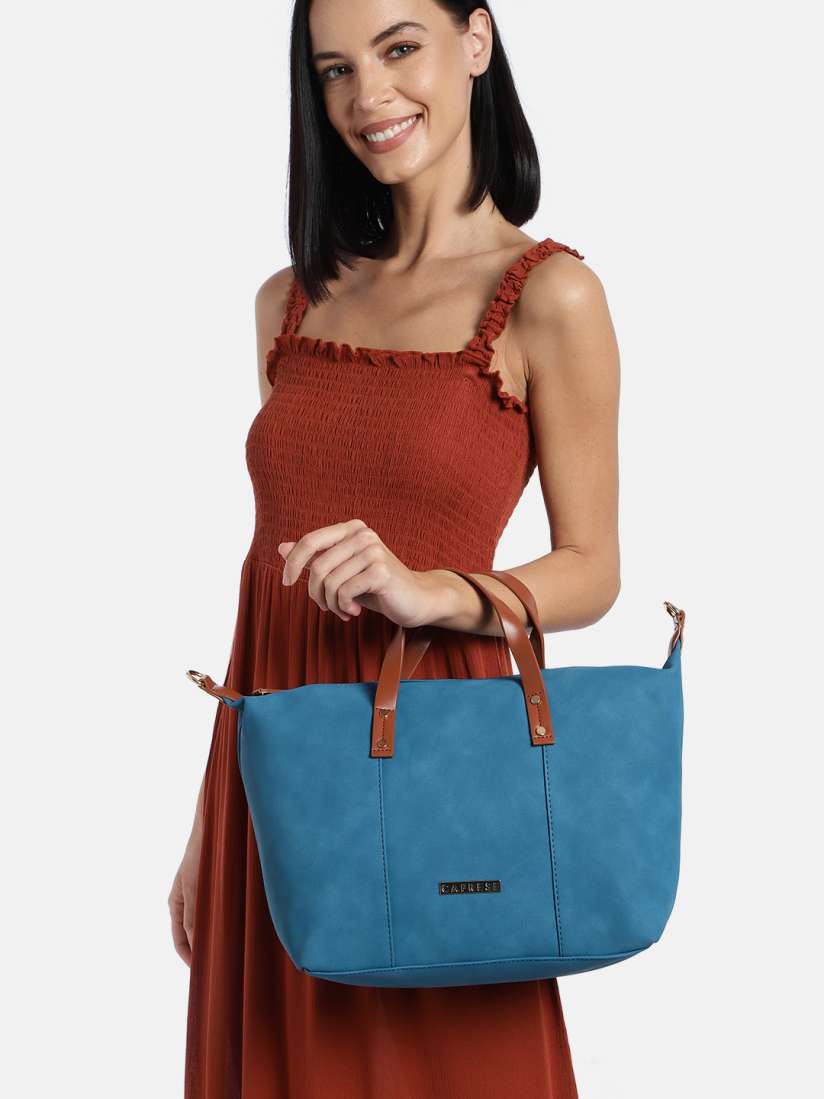 Caprese blue solid handheld bag clearance