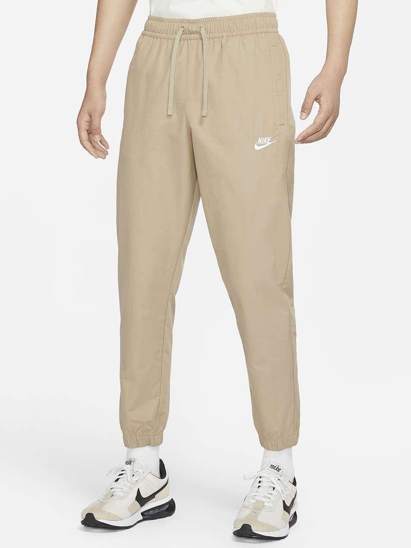 nike track pants beige