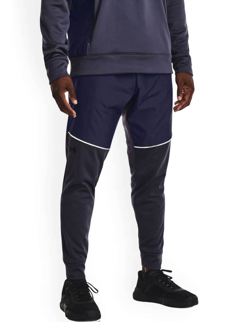 Buy UNDER ARMOUR Men Armour Fleece Storm Mid Rise Track Pants Track Pants for Men 25257704 Myntra