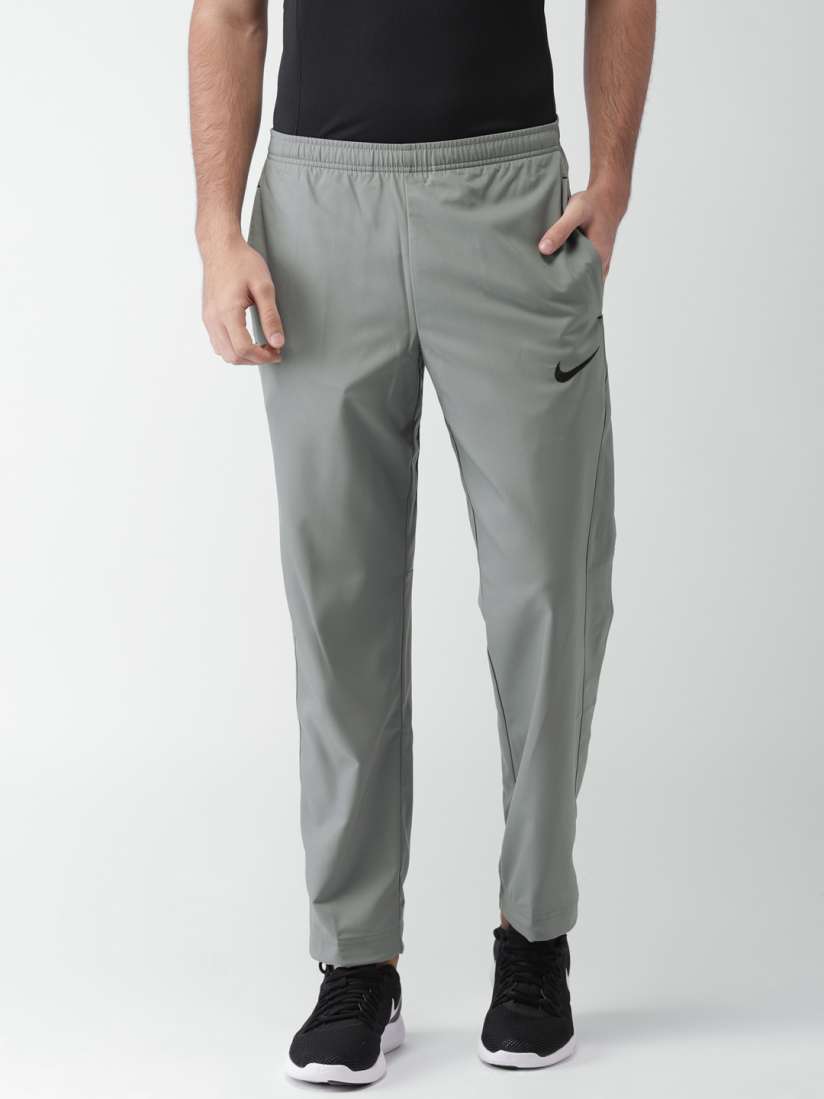 Buy Nike Men Grey AS TEAM WOVEN Track Pants Track Pants for Men 2529668 Myntra