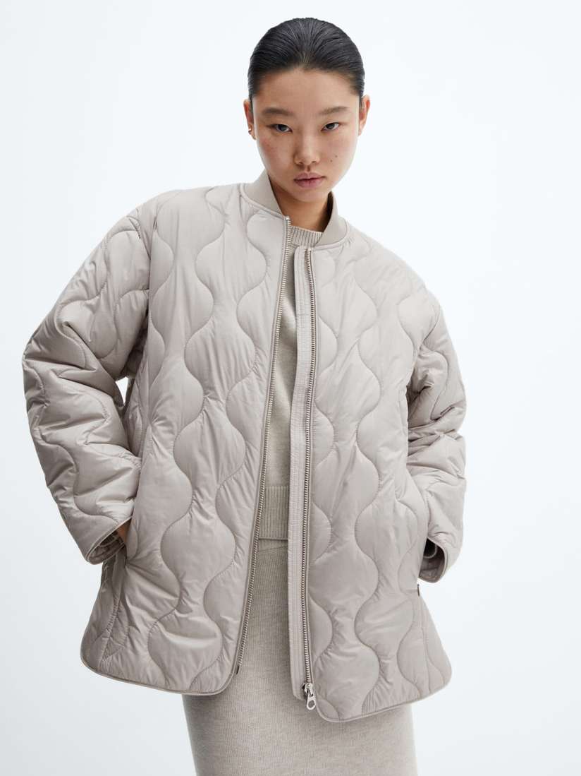 Water resistant quilted jacket top