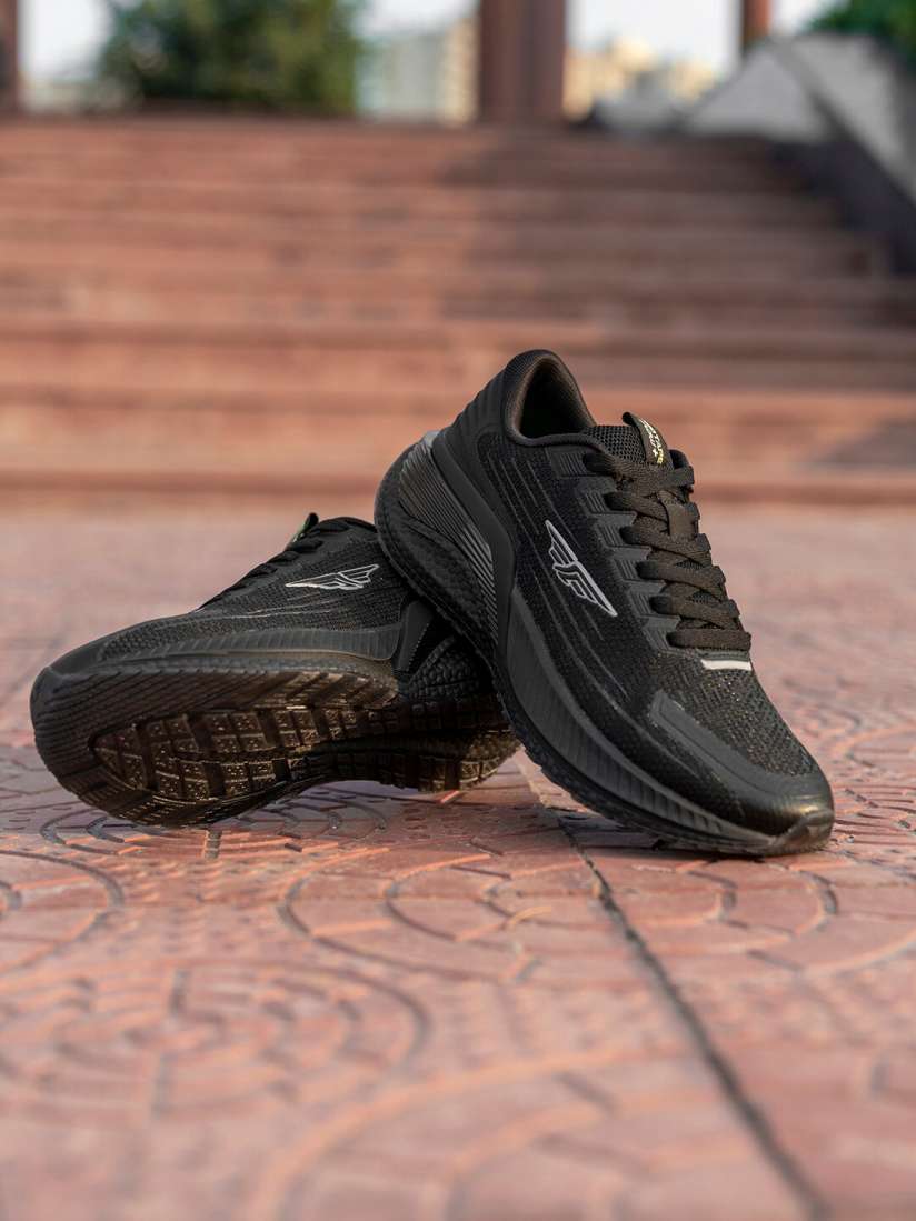 Red tape all black sports shoes on sale
