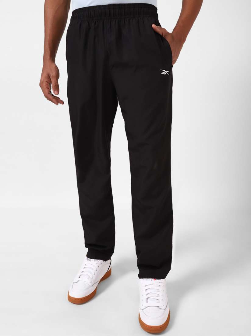 Buy Reebok Men El Woven Ul Mid Rise Track Pants Track Pants for Men 26117512 Myntra