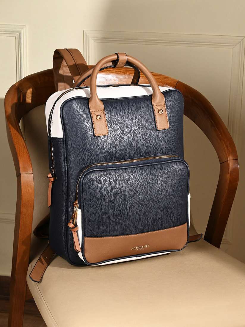 Faux leather backpack with laptop sleeve discount